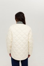 Біла стьобана куртка 3947 фото 3