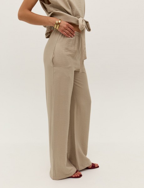 Бежеві штані 39873987 купить